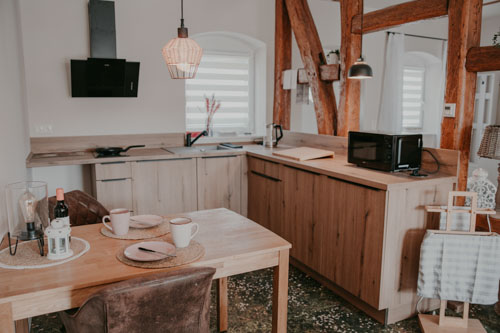 Offene Küche mit Essbereich in der Villa Gänseblümchen